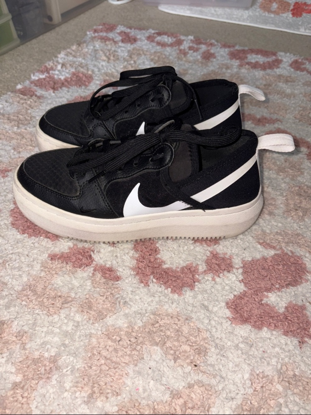 Women’s black Nike Court Vision